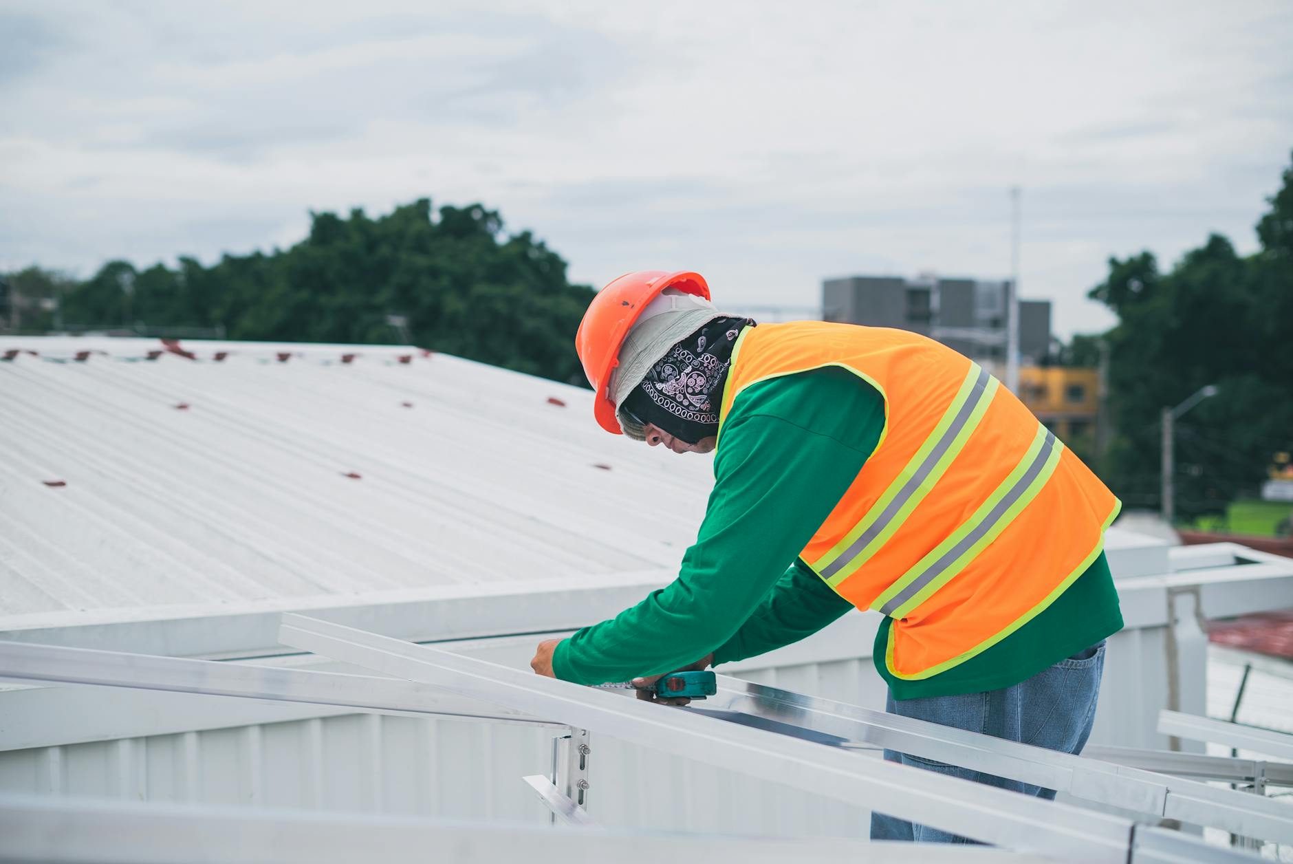 A professional roofing crew installing a durable flat roof TPO system on a commercial building in Sunrise Manor.